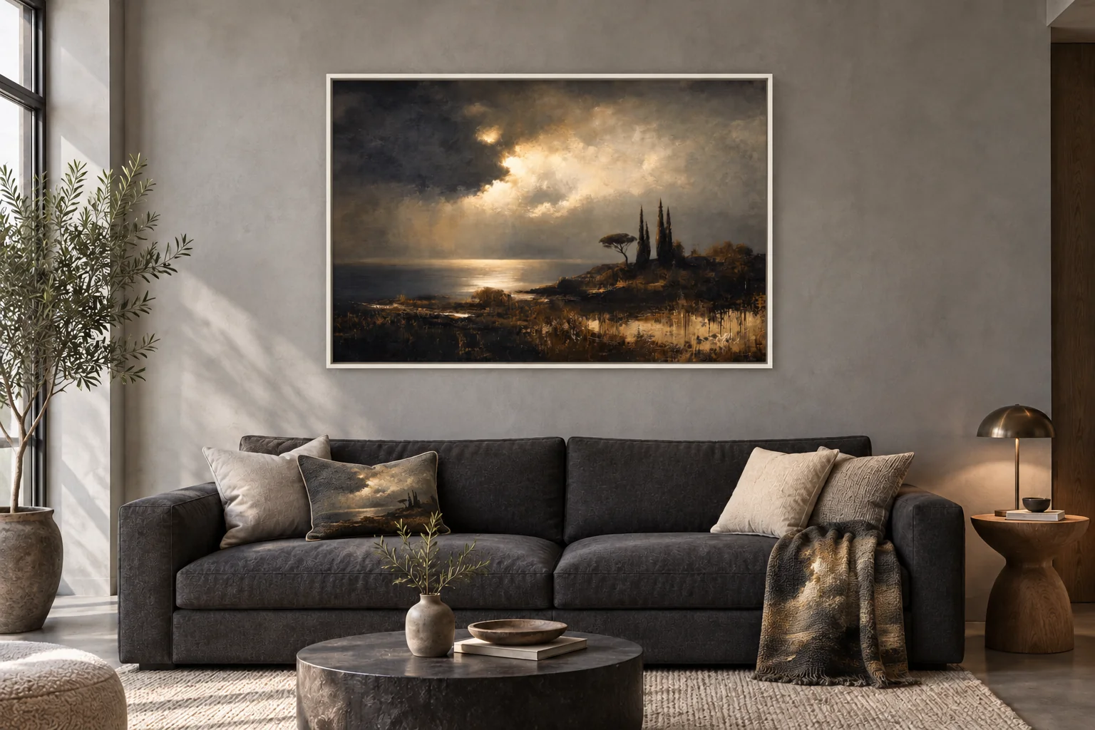 A charcoal sofa beneath a large AMVIA landscape, with one coordinating art cushion and throw.